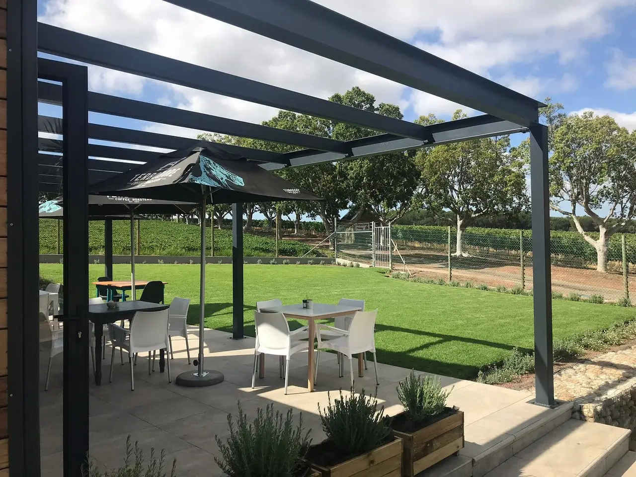 Bluebird Café patio with vineyard views